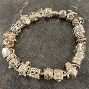 Pandora .925 Charm Bracelet with Charms.